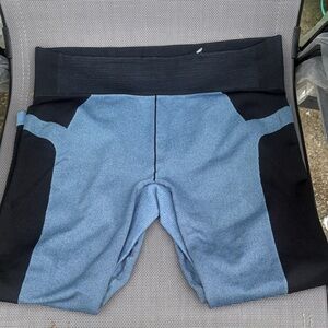 Under Armour Black and Blue Performance short pants 
Size:L